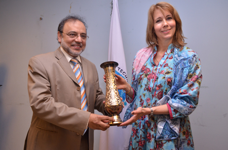 Rector UMT , Dr Hasan Sohaib Murad presents souvenir to Kristiane Backer